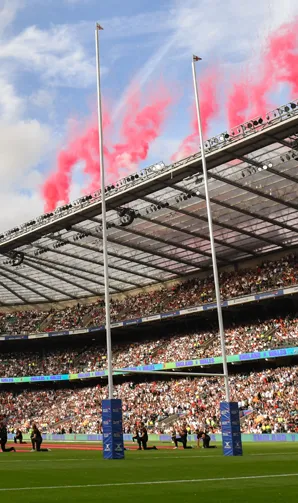 Twickenham Stadium erupts with celebratory coloured smoke at the opening of the 6 Nations